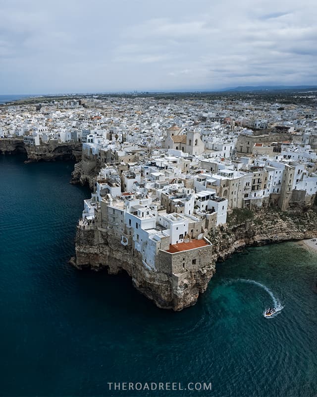 https://www.theroadreel.com/wp-content/uploads/2024/03/Polignano-a-Mare-Puglia-coastal-towns-2-V.jpg
